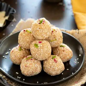 Til ke Ladoo stacked in a plate