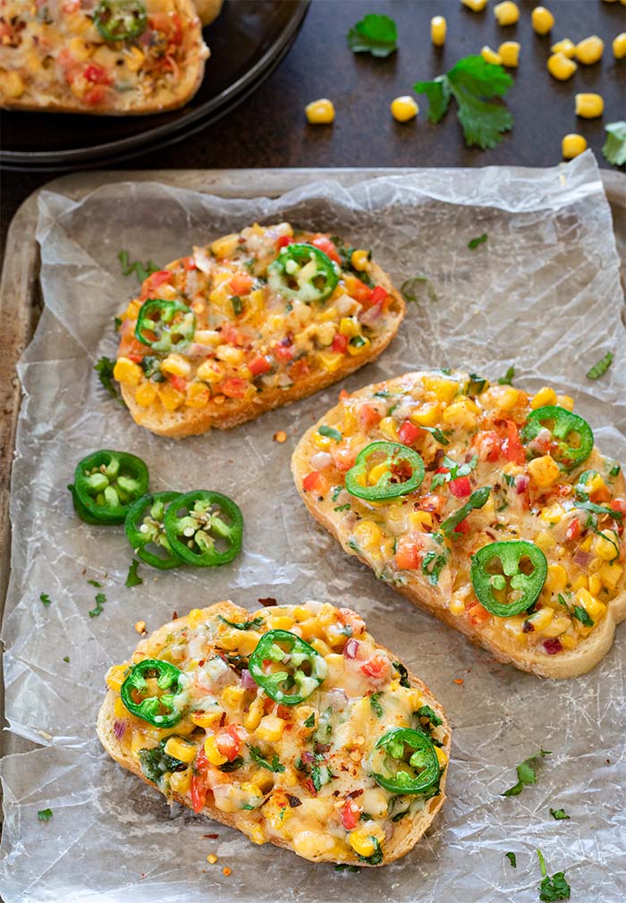 Corn Toast garnished with green chilies