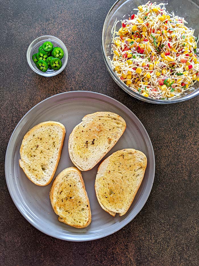 Assemble toast with corn mix