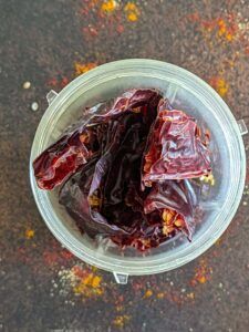 Grind the chilies