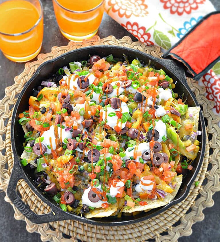 Sheet Pan Nachos in a cast Iron Pan
