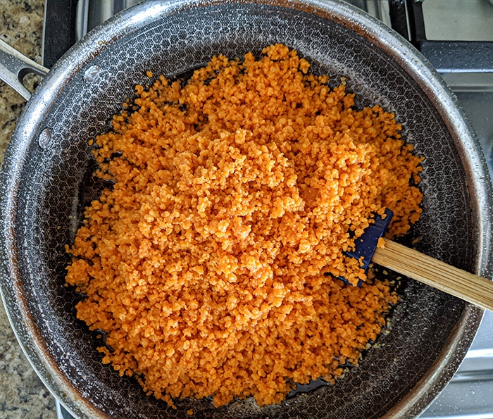 Add motichoor boondi to warm syrup