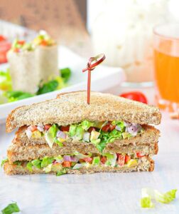 Quick and Easy Avocado Mayo Sandwich layered with fresh ingredients