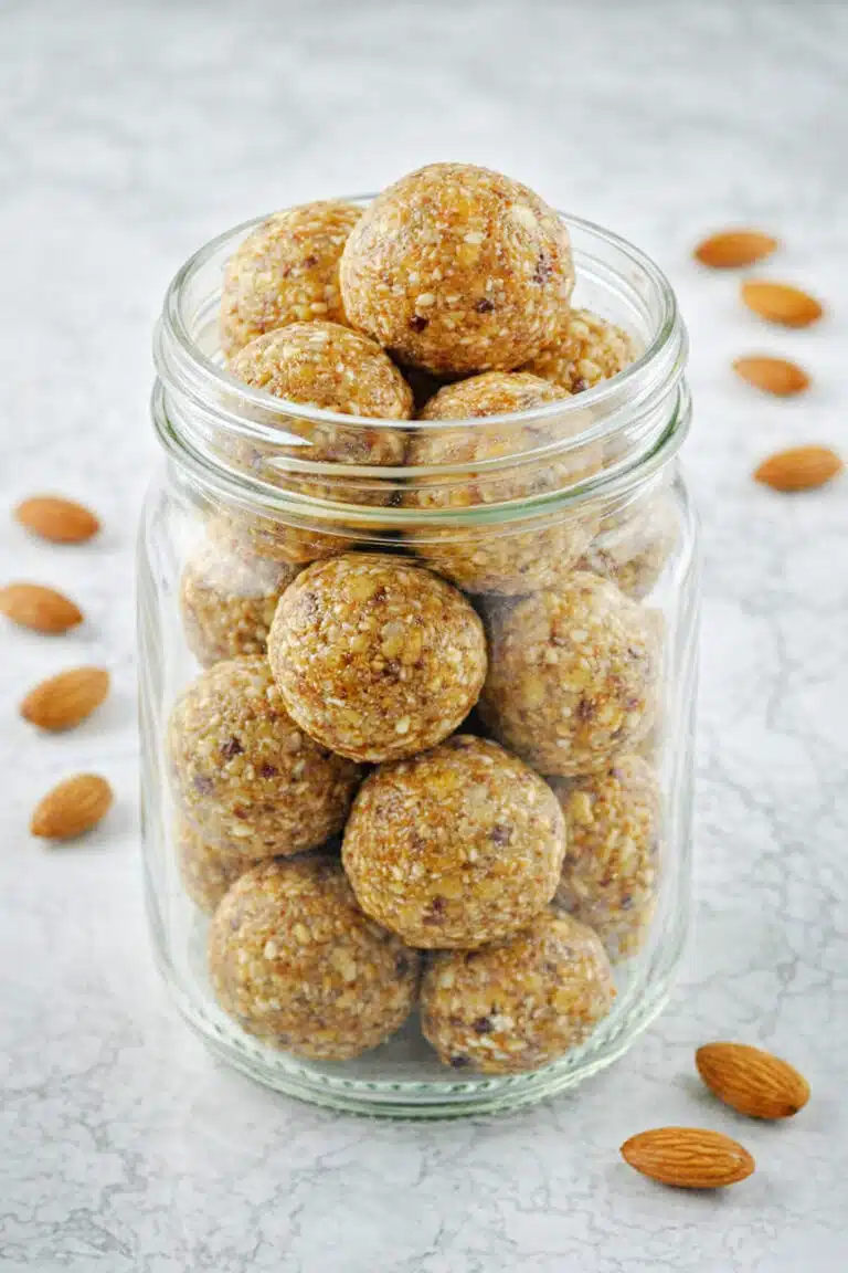 Easy vegan gluten free energy balls served in a white bowl on a napkin