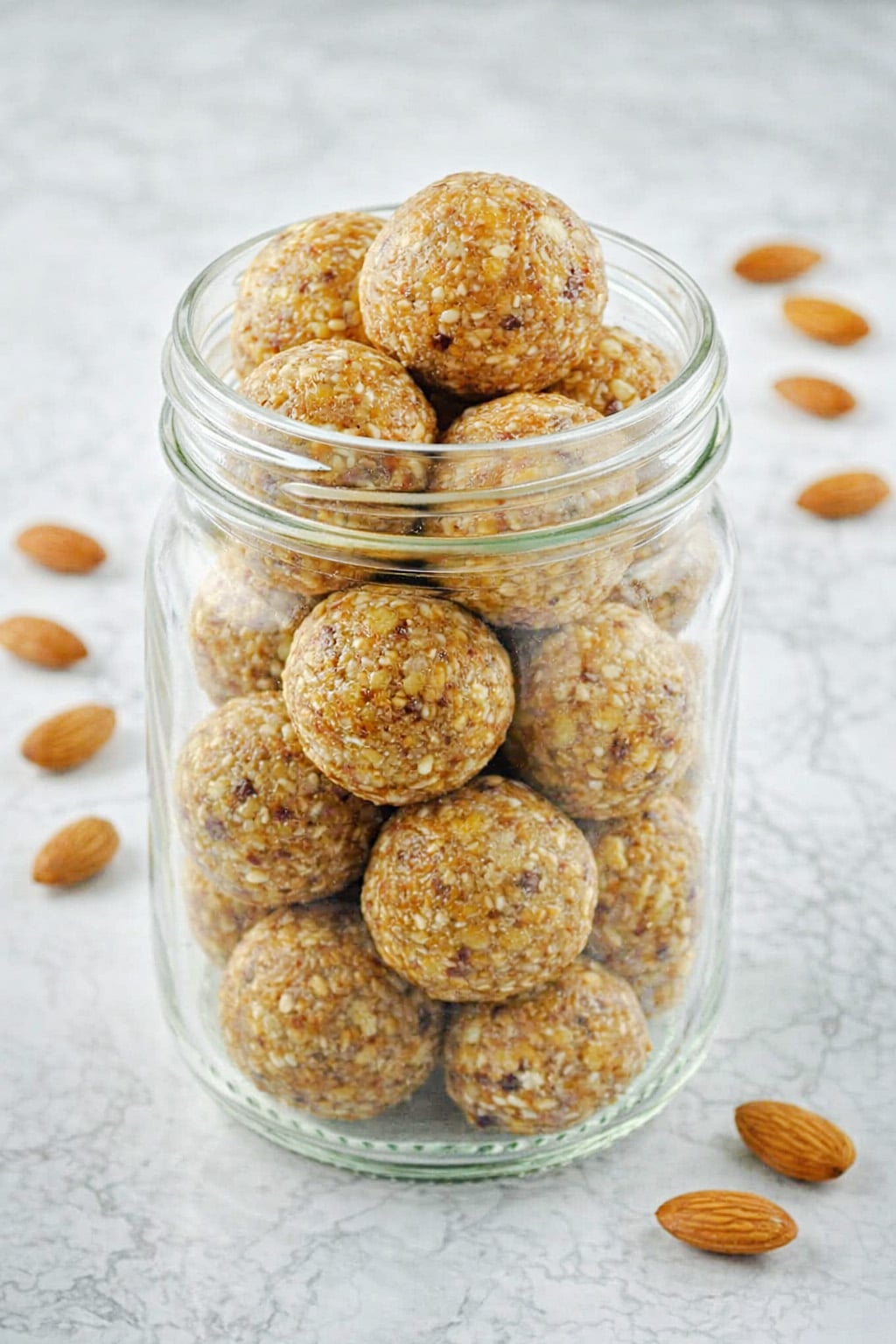 Easy vegan gluten free energy balls served in a white bowl on a napkin
