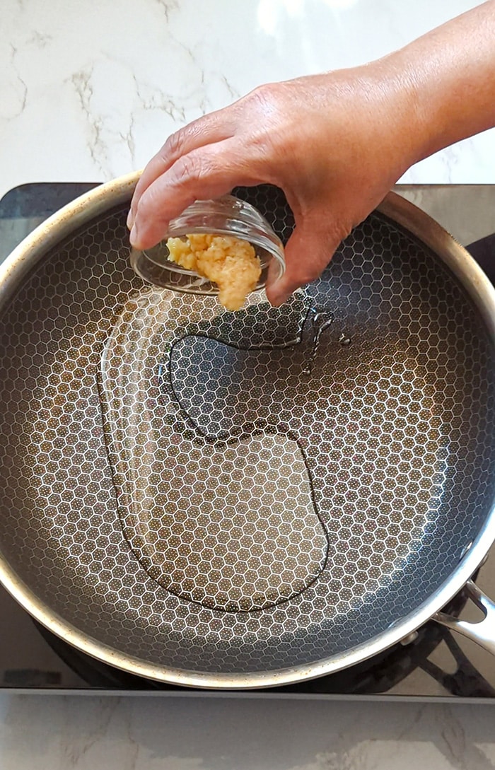 Cook garlic in a pan