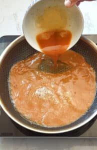 Add chili sauce to the pan