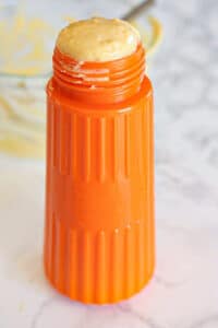 Add batter to a squeezable bottle