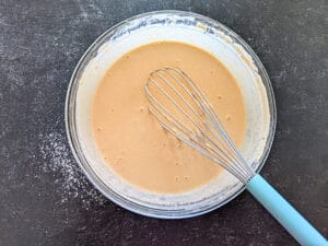 Whisk the batter again