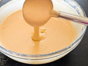 Jalebi batter should be of free-flowing consistency