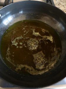 Simmering sugar syrup in a kadhai