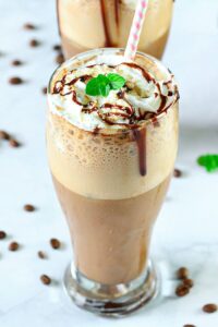 Iced tiramisu latte with mint leaves