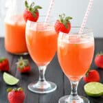 Fresh Strawberry Mint Lemonade served in tall glasses with lemon slices and mint leaves