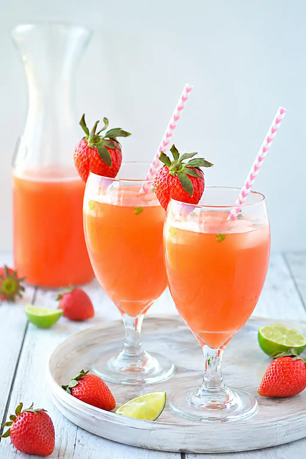 Homemade mint lemonade made with fresh strawberries, lemon juice, honey, and mint