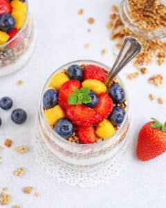 Colorful berry granola parfait served in a glass for a quick healthy breakfast