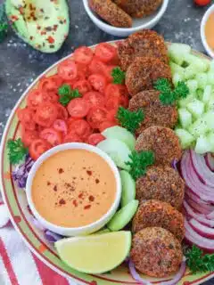 Vegan Falafel Salad with cucumber, lettuce, and tomatoes