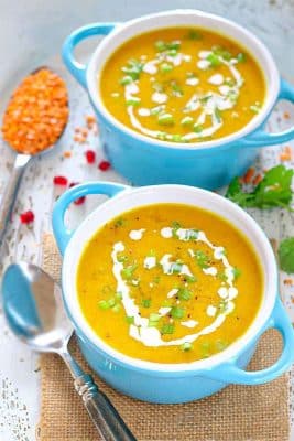 Roasted Butternut Squash and Lentil Soup in bowls garnished with scallions