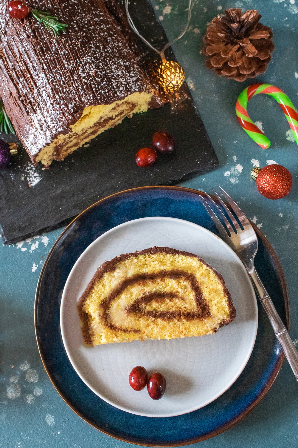 Cut slice of Yule Log Cake