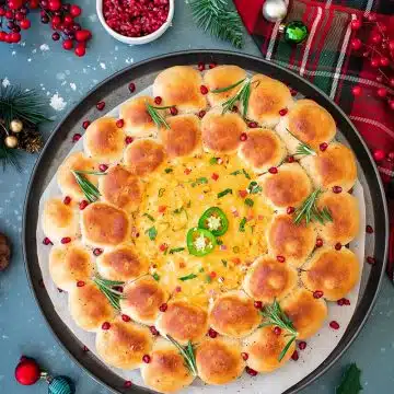 Baked Holiday Wreath Bread with corn dip in the center