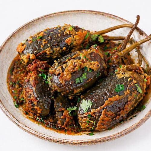 Bharwa Baingan cooked in tomato coconut masala