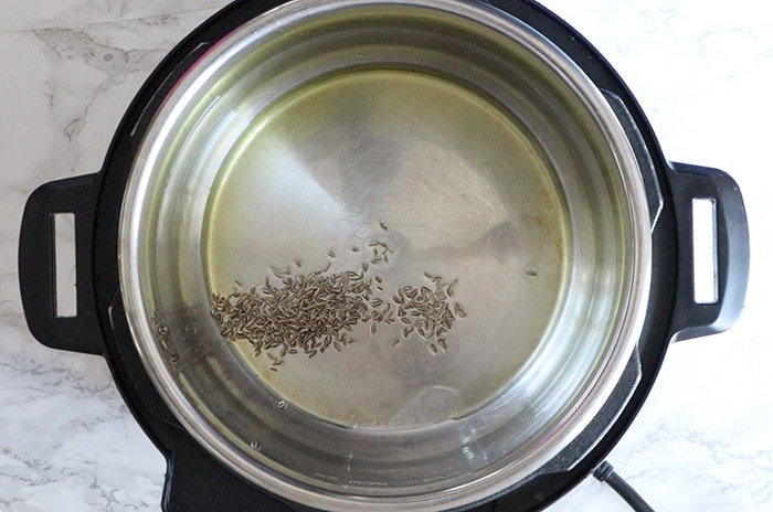 Add cumin seeds