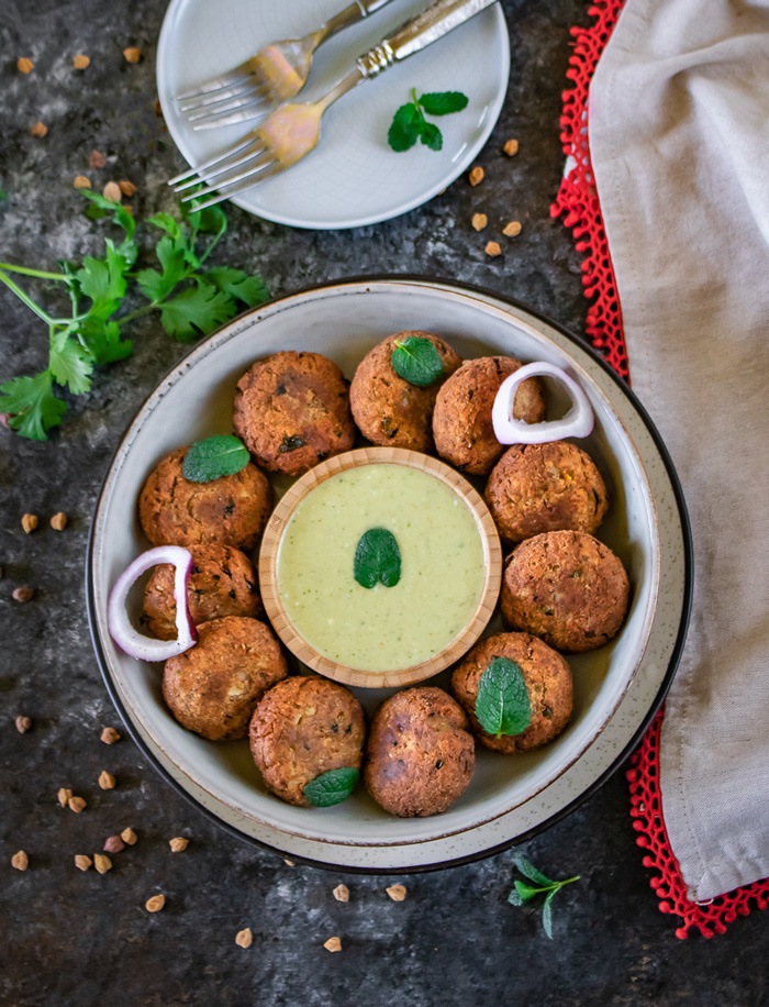 Shammi kababs with mint chutney and leaves
