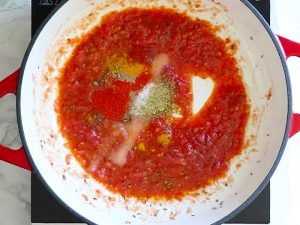 Cook tomato puree for 4-5 minutes and add spices