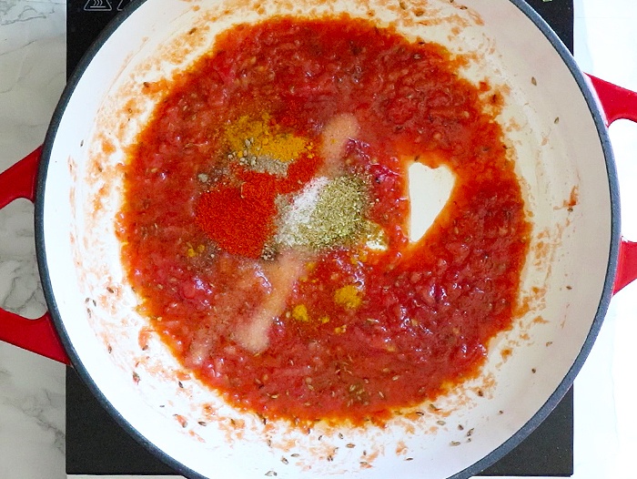 Cook tomato puree for 4-5 minutes and add spices