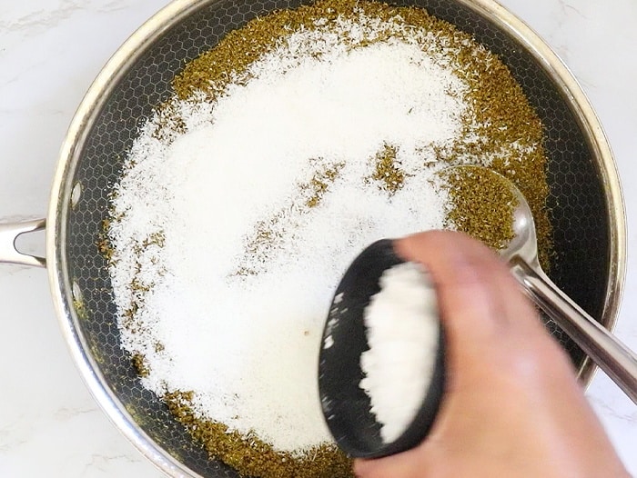 Add Coconut powder and powdered sugar