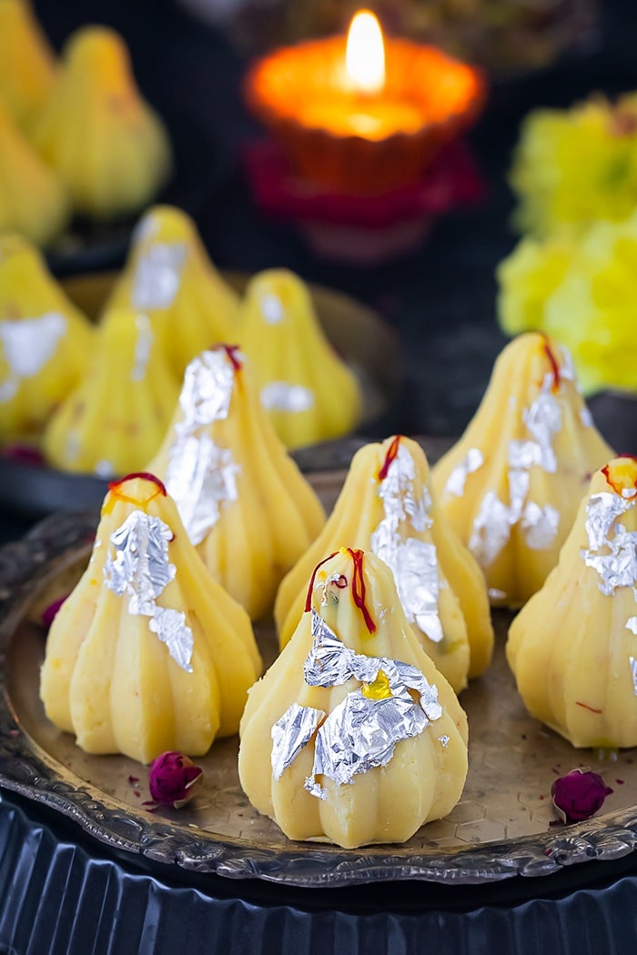 Kesar Mawa Modak with silver leaf garnish