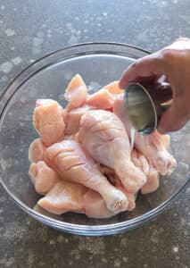 Add lemon juice to chicken