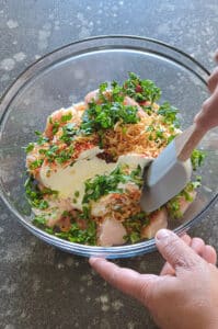 Rub the marinade all over the chicken