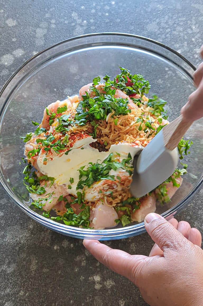 Rub the marinade all over the chicken
