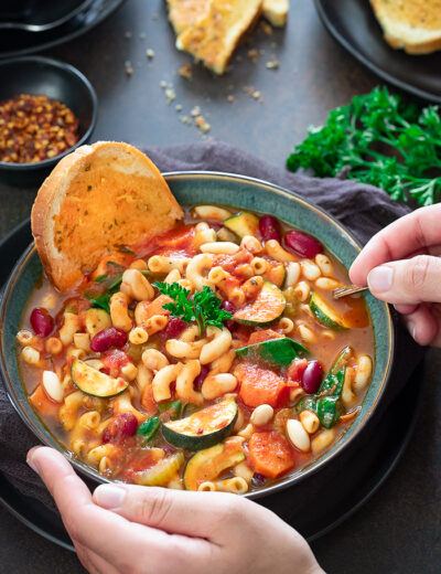 Instant Pot Minestrone soup with a slice of bread