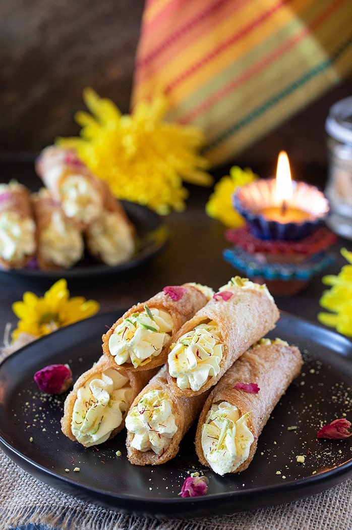 Stacked Baked Shahi Tukda Cannoli on a plate