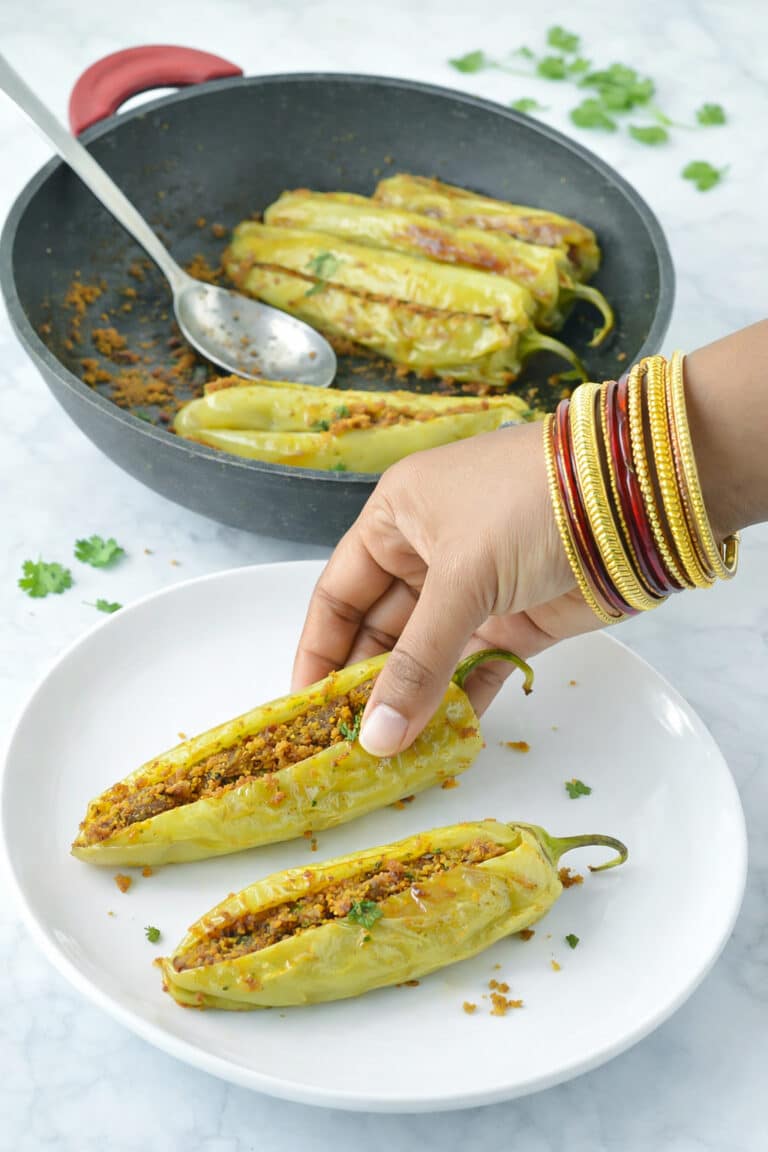 Serve Bharwan Mirchi with warm Rotis