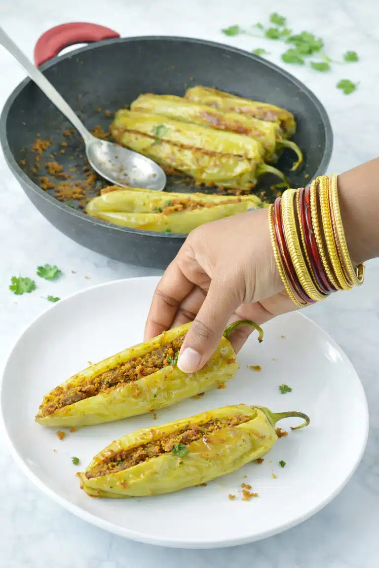 Serve Bharwan Mirchi with warm Rotis