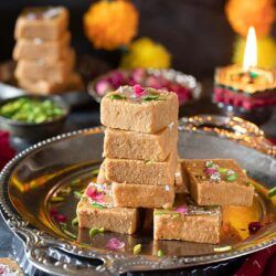 Stacked Mohanthal in a plate
