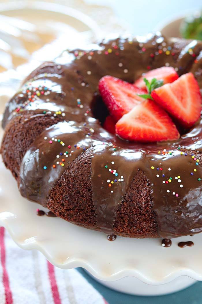 Vegan chocolate cake drizzled with fudge