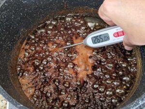 Boil Jaggery and water in a pan