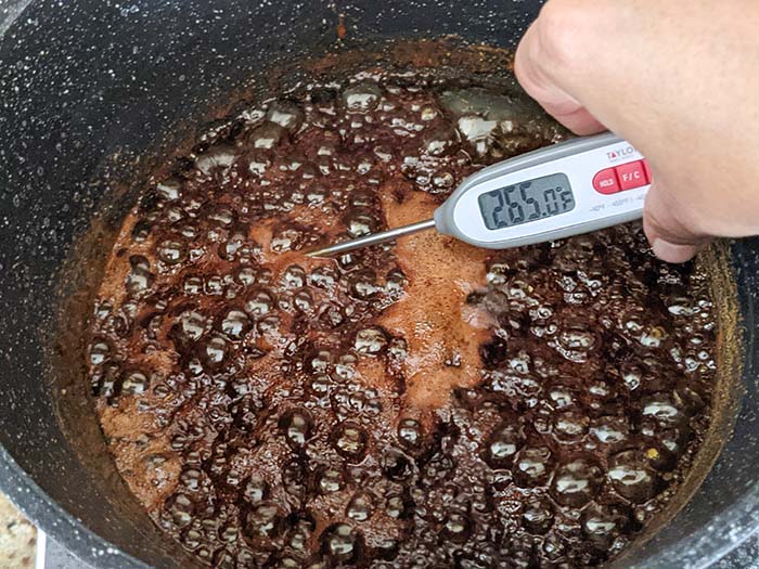 Boil Jaggery and water in a pan