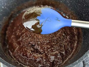 Jaggery syrup on spoon