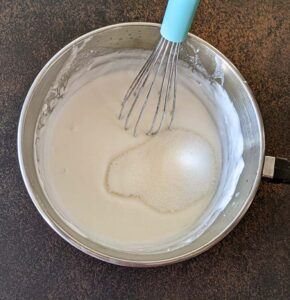 Add sugar to milk