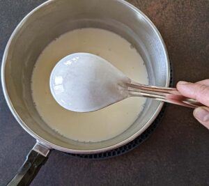 Mix will coat the spoon.