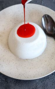 Pour strawberry coulis on top