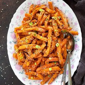 Crispy Chili Honey Potatoes on a tray