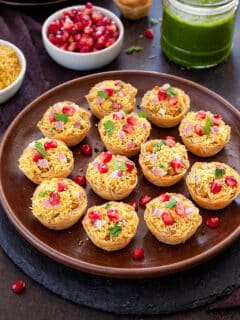 Baked Kachori Bites on a plate with chutneys
