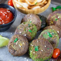 Hara Bhara Kabab recipe in a tray with chutney