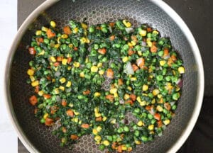 Cook spinach wit veggies