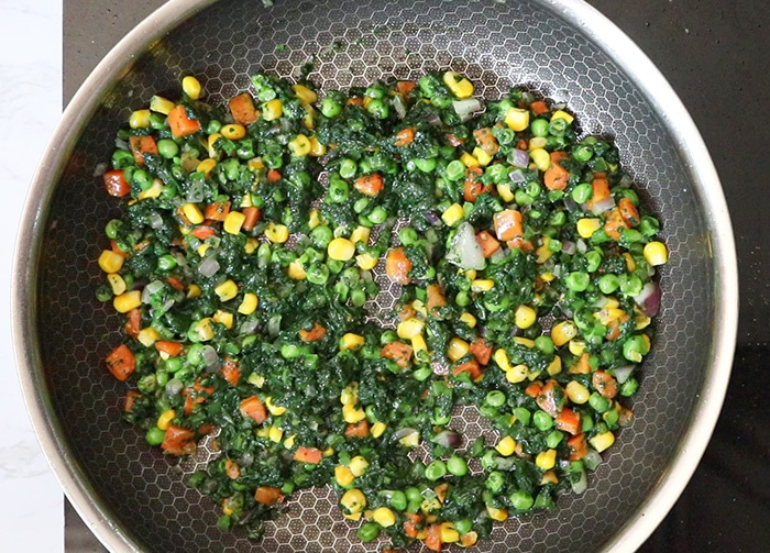 Cook spinach wit veggies